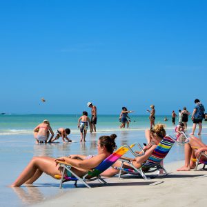Sunbathers at Siesta Beach on Siesta Key in Sarasota, Florida - Encircle Photos