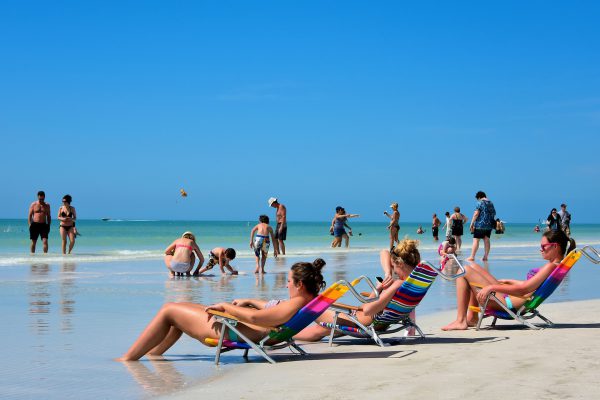Sunbathers at Siesta Beach on Siesta Key in Sarasota, Florida - Encircle Photos