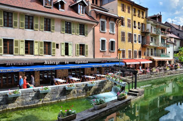 Outdoor Café along Thiou Canal in Annecy, France - Encircle Photos