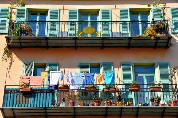 Drying Laundry and Flower Pots on Terraces in Nice, France - Encircle Photos