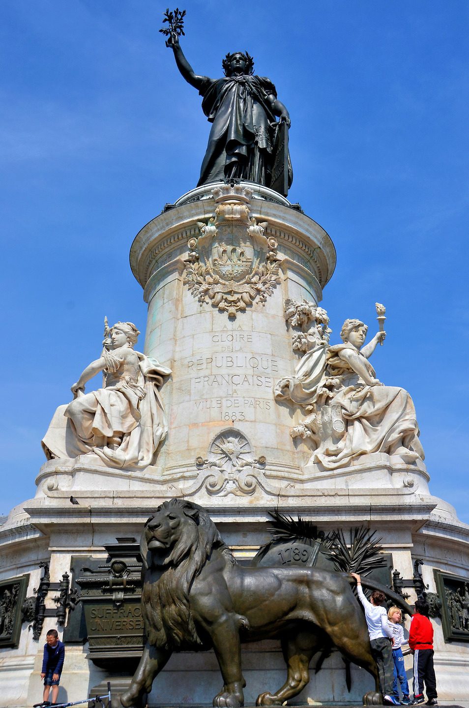 Marianne Statue at Place de la République in Paris, France Encircle
