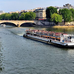 Tourist Boat on Seine from Pont d’Arcole Bridge in Paris, France - Encircle Photos