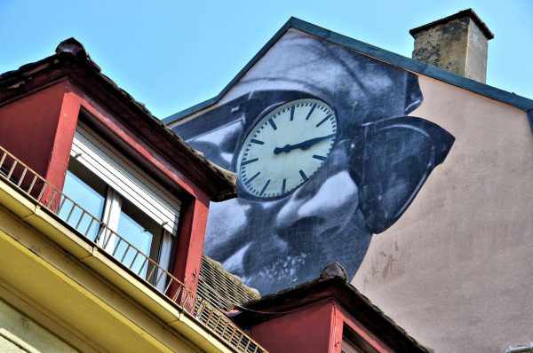 Unframed Street Mural by JR in Baden-Baden, Germany - Encircle Photos