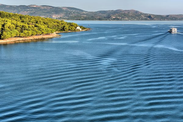 Boat Approaching Kefalonia Island near Argostoli, Greece - Encircle Photos