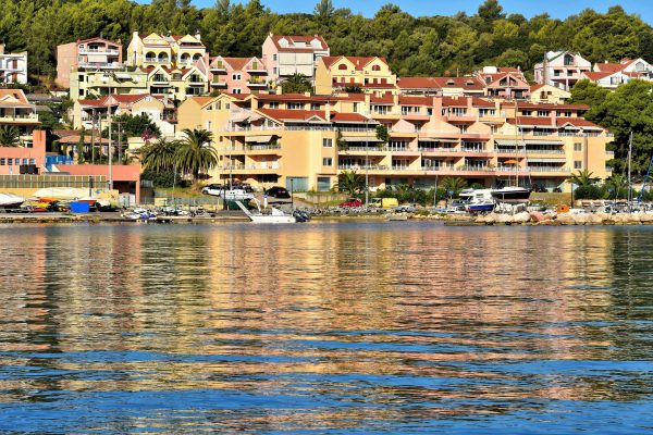 Cityscape Reflecting in Bay in Argostoli, Greece - Encircle Photos