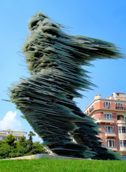 Dromeas The Runner Man Glass Sculpture in Athens, Greece - Encircle Photos