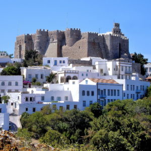 Whitewashed Homes Encircling Monastery of St. John at Chora on Patmos, Greece - Encircle Photos