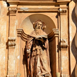 Statue on Church of San Francisco in Antigua, Guatemala - Encircle Photos
