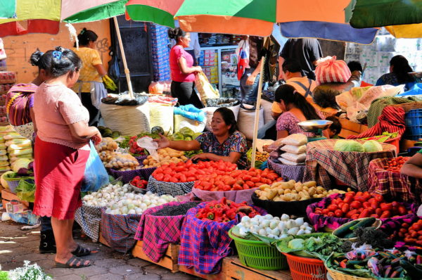 Women Shopping at El Mercado Farmers’ Market in Antigua, Guatemala - Encircle Photos
