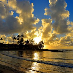 Sunrise at Po’ipū Beach at Po’ipū on Kaua’i, Hawaii - Encircle Photos