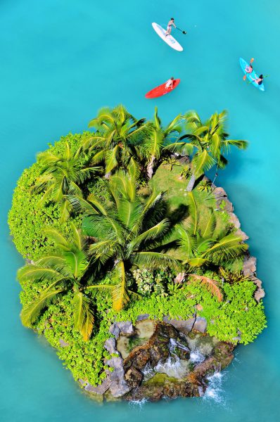Island in Lagoon with Paddle Boarders in Honolulu, O’ahu, Hawaii - Encircle Photos