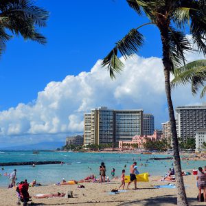 Crowd Sunning at Prince Kūhiō Beach at Waikīkī in Honolulu, O’ahu, Hawaii - Encircle Photos