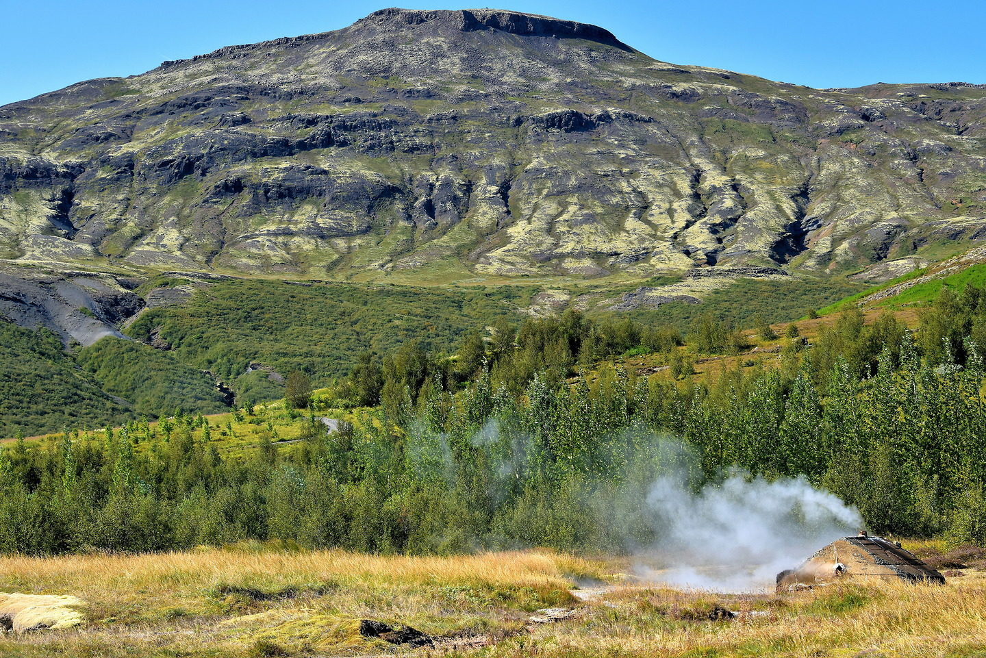Smidur at Geysir Hot Springs on Golden Circle, Iceland - Encircle Photos