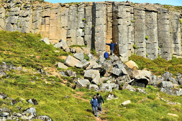 People Admiring Gerðuberg Basalt Columns on Snæfellsnes Peninsula, Iceland - Encircle Photos