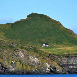 Lone House on Elliðaey Island in Westman Islands, Iceland - Encircle Photos