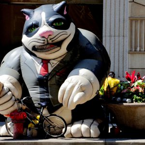 Fat Cat Balloon Strangling Construction Worker in Chicago, Illinois - Encircle Photos