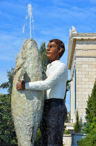 Man With Fish Statue in Chicago, Illinois - Encircle Photos