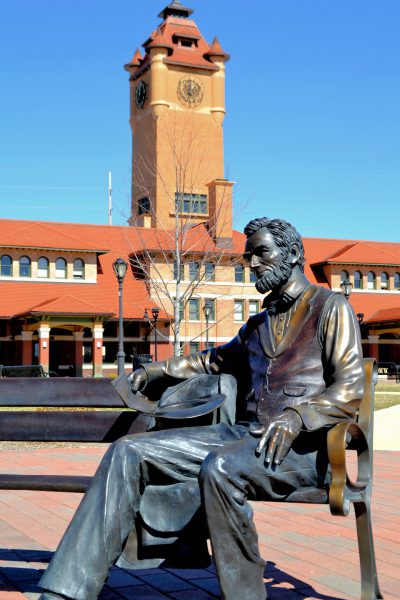 Abe Lincoln Sitting on Bench in Front of Springfield Union Station in Springfield, Illinois - Encircle Photos