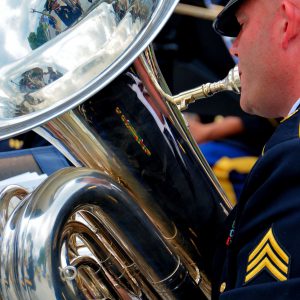 Serviceman Plays Tuba at Indiana World War Memorial in Indianapolis, Indiana - Encircle Photos