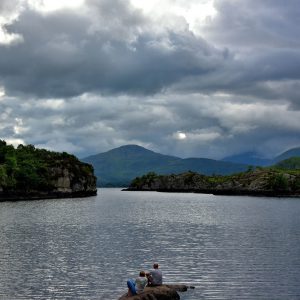 Couple Admiring Upper Lake along the Ring of Kerry, Ireland - Encircle Photos