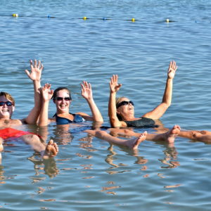 Floating in Dead Sea in Israel - Encircle Photos