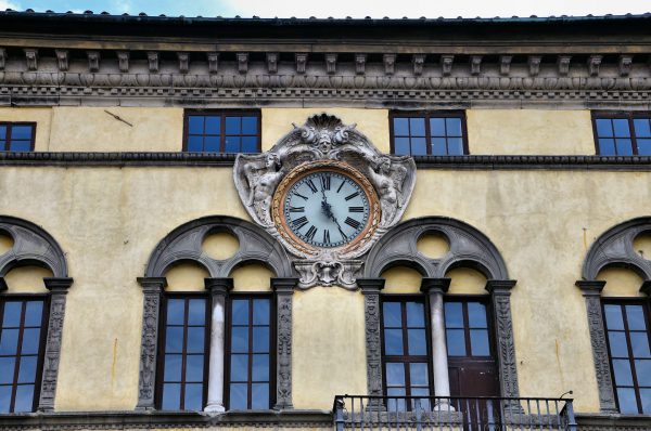 Clock on Pretorio Palace in Lucca, Italy - Encircle Photos