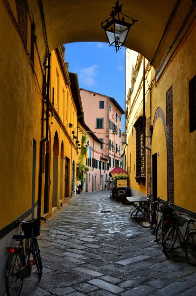 Narrow Cobblestone Street in Lucca, Italy - Encircle Photos
