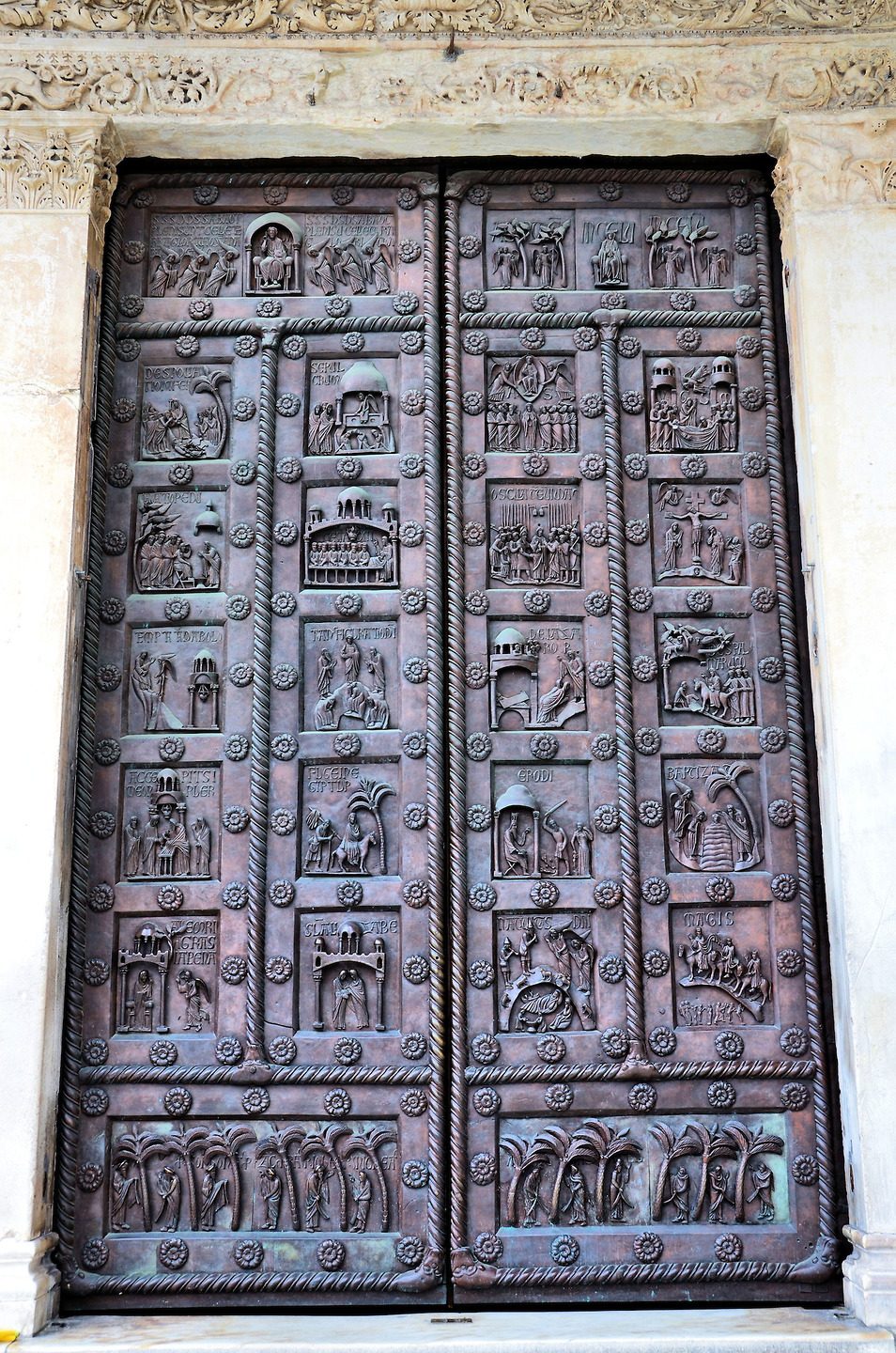 Porta di San Ranieri on Pisa Cathedral in Pisa, Italy - Encircle Photos