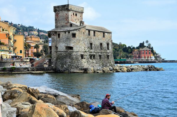 Fisherman along Harbor in Rapallo, Italy - Encircle Photos