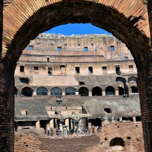 View of Colosseum’s Arena through Arch in Rome, Italy - Encircle Photos