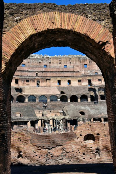 View of Colosseum’s Arena through Arch in Rome, Italy - Encircle Photos