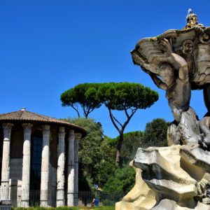 Hercules Temple and Triton Fountain at Piazza Bocca della Verità in Rome, Italy - Encircle Photos
