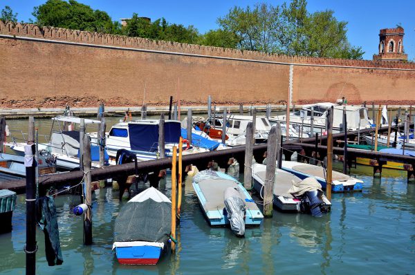 Brick Wall, Bell Tower and Moored Boats in Venice, Italy - Encircle Photos