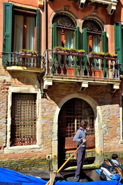 Serenading Gondolier in Venice, Italy - Encircle Photos