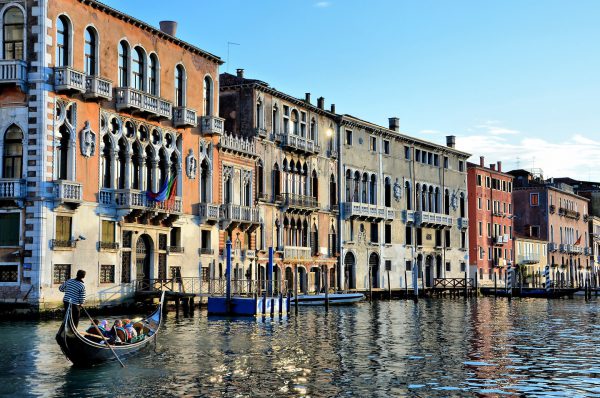 Tourists on Gondola on Grand Canal in Venice, Italy - Encircle Photos