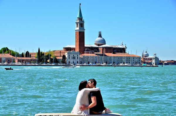 Young Couple Kissing along Riva degli Schiavoni in Venice, Italy - Encircle Photos
