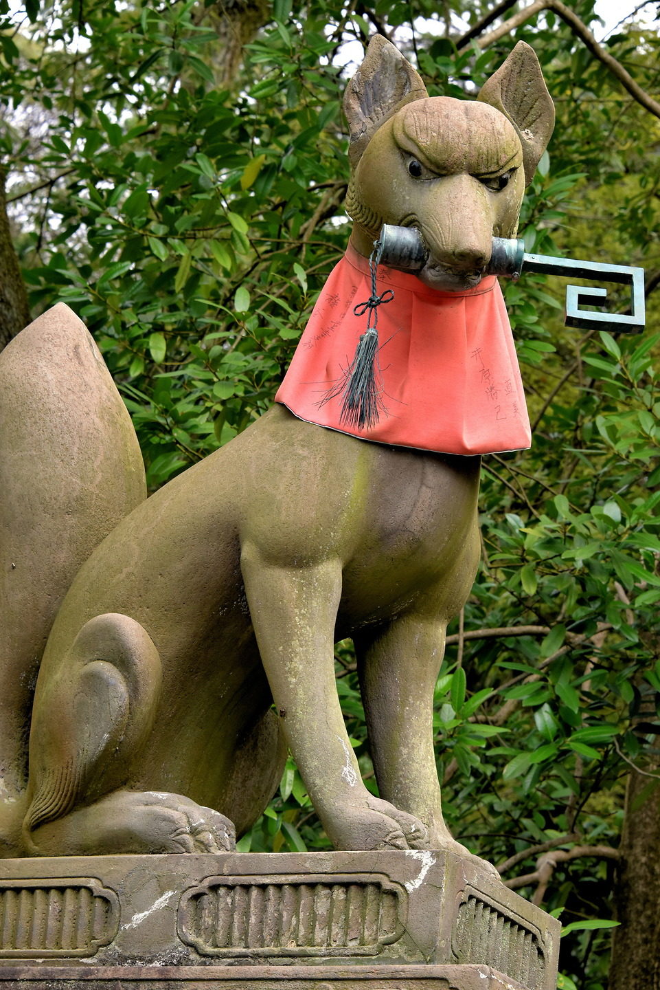 Fox Holding Key at Fushimi Inari Taisha in Kyoto, Japan Encircle Photos