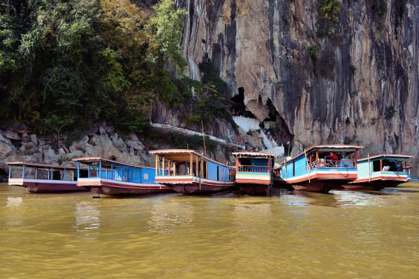 Slow Boats at Pak Ou Caves Entrance in Ban Pak Ou, Laos - Encircle Photos