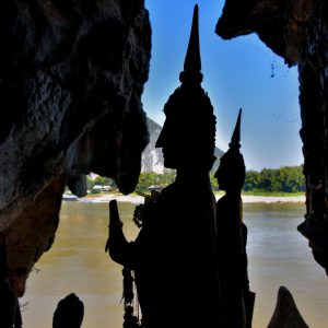 Silhouettes of Buddhist Statues at Pak Ou Caves in Ban Pak Ou, Laos - Encircle Photos