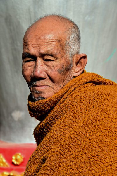 Profile of Very Old Monk in Ban Xang Hai in Laos - Encircle Photos