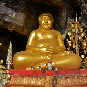 Gilded Happy Buddha on Mount Phousi in Luang Prabang, Laos - Encircle Photos