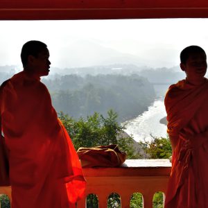 Novice Monks on Terrace at Mount Phousi in Luang Prabang, Laos - Encircle Photos