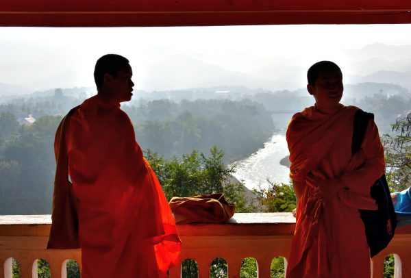 Novice Monks on Terrace at Mount Phousi in Luang Prabang, Laos - Encircle Photos
