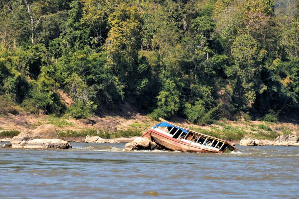 Slow Boat Capsized on Rocks in Luang Prabang, Laos - Encircle Photos