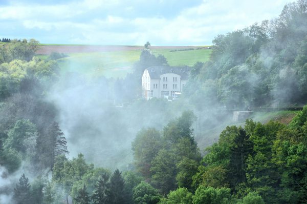 Smoke-filled Our River Valley in Vianden, Luxembourg - Encircle Photos