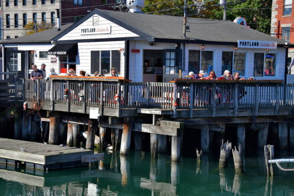 Eating Lobster on Waterfront in Portland, Maine - Encircle Photos