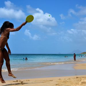 Women Playing Paddleball at Salines Beach near Sainte-Anne, Martinique - Encircle Photos