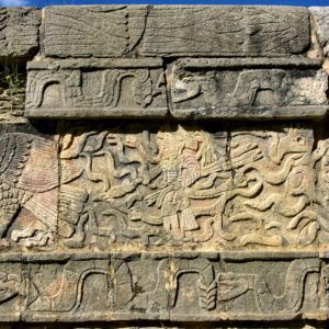Eagles Holding Heart Carvings along El Tzompantli at Chichen Itza, Mexico - Encircle Photos
