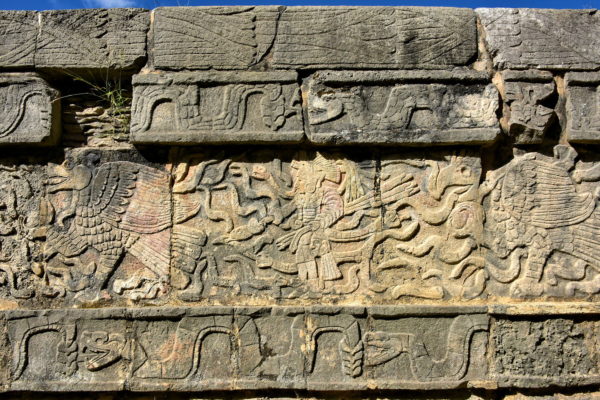 Eagles Holding Heart Carvings along El Tzompantli at Chichen Itza, Mexico - Encircle Photos