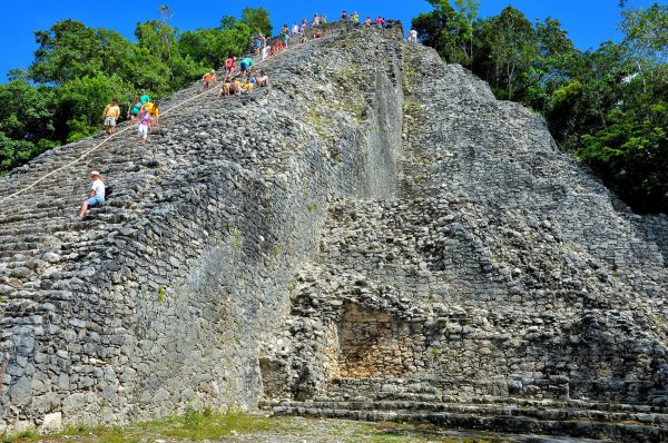 People Climbing Ixmoja Pyramid at Mayan Ruins in Coba, Mexico - Encircle Photos